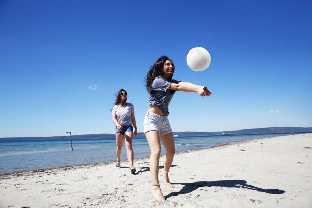 istock Friends playing volleybal 947970692