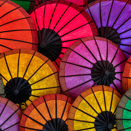 Collection of colorful parasols in the night market of Luang Prabang Laos