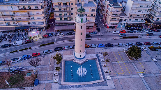 Aerial shot of the northern Greek city of Alexandroupolis with the lighthouse under a winter sunset