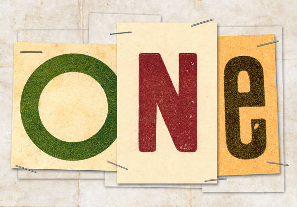 istock The word one made with old papers and letters 947982946