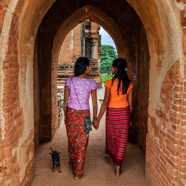 istock Young Burmese girls walking in Bagan, Myanmar 947988540