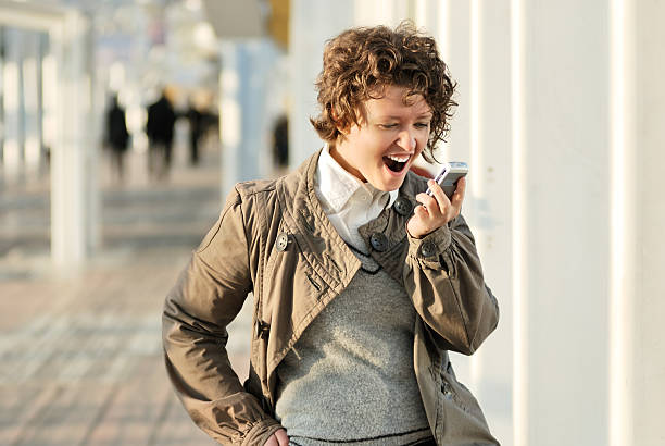 istock Young cheerful woman calling phone 94799291