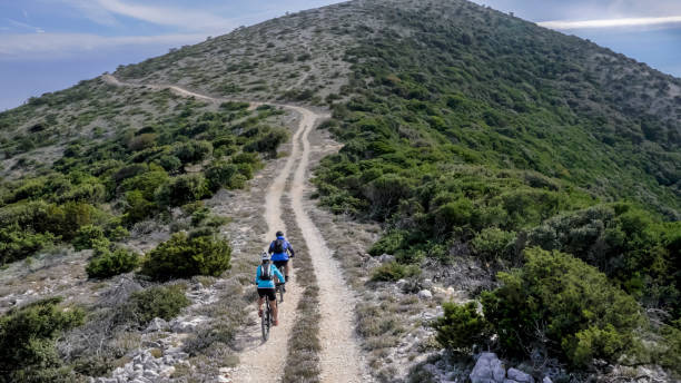 istock Two men cycling along ridge on trail 948009272