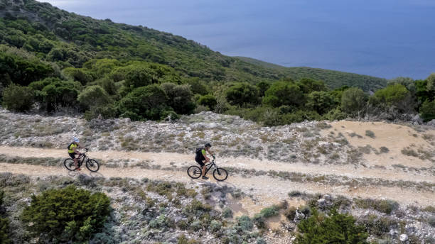 istock Two men cycling along ridge on trail 948009486
