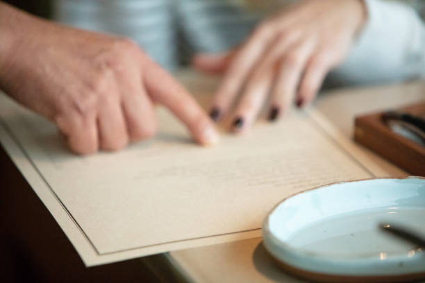 Wait staff explaining menu