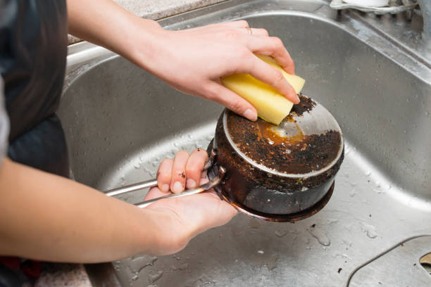 Wash a dirty pot Wash a dirty pot sharpening photos stock pictures, royalty-free photos & images