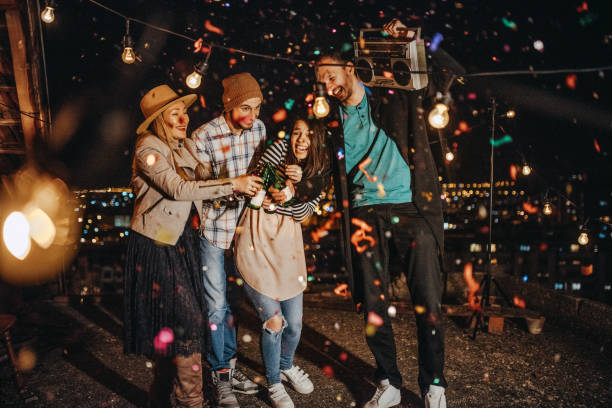 istock Celebratory toast on the rooftop for a birthday party 948033224