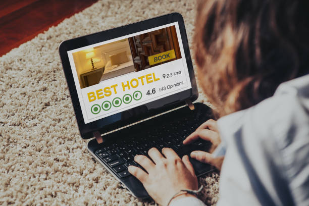 istock Woman booking the best hotel by internet with a laptop computer. 948042718
