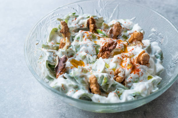 istock Walnut Salad with Purslane and Yogurt in Glass Bowl. 948043808
