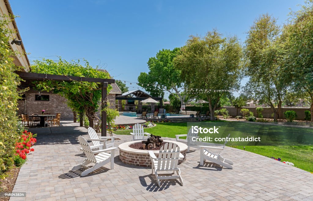 Modern Home Exterior Backyard photo of a modern home. Patio Stock Photo