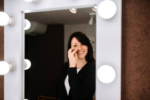 istock Image of young woman removing make up. Front view. 948055816