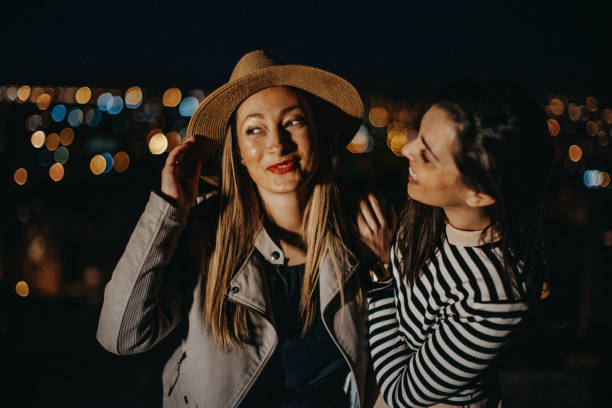 istock Girls on a rooftop party 948080656