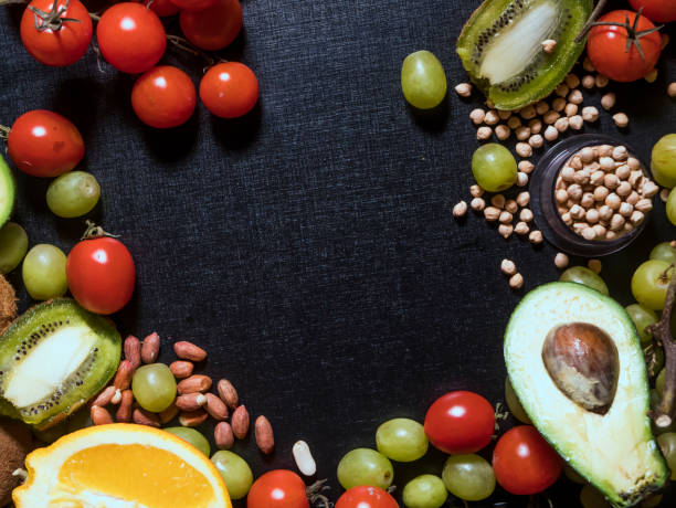 istock organic natural fresh superfood fruit seed and nuts on dark background copy space 948082376