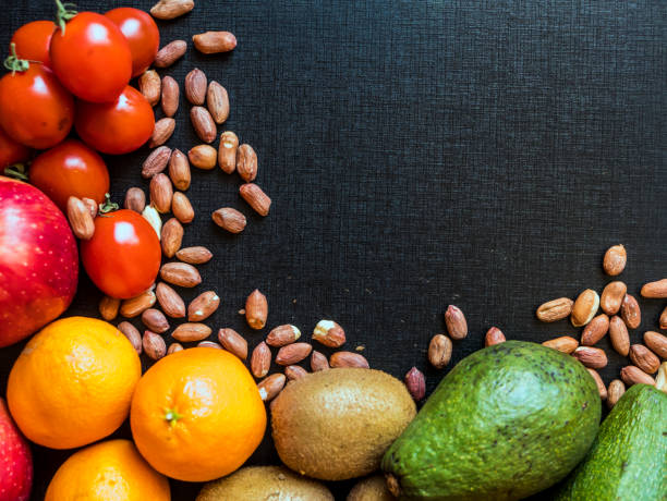istock organic natural fresh superfood fruit seed and nuts on dark background copy space 948082430
