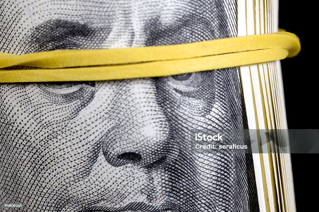 honest or rich? - bundle of dollars  Money Laundering Stock Photo