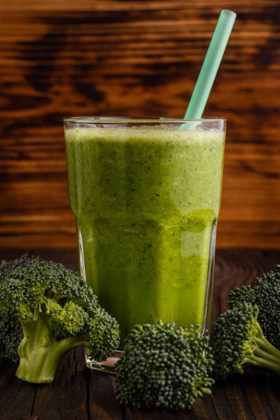 istock fresh broccoli juice on a wooden background 948094948