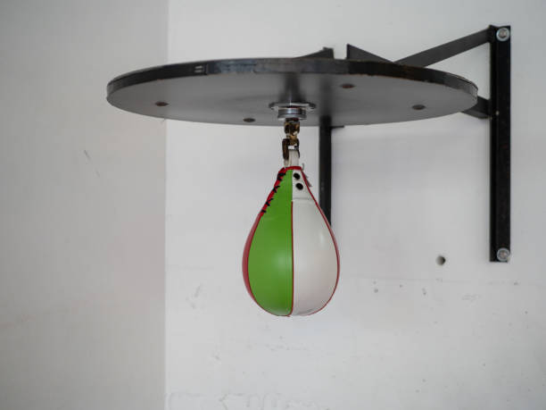 istock Boxing speed bag hanging in gym 948095128