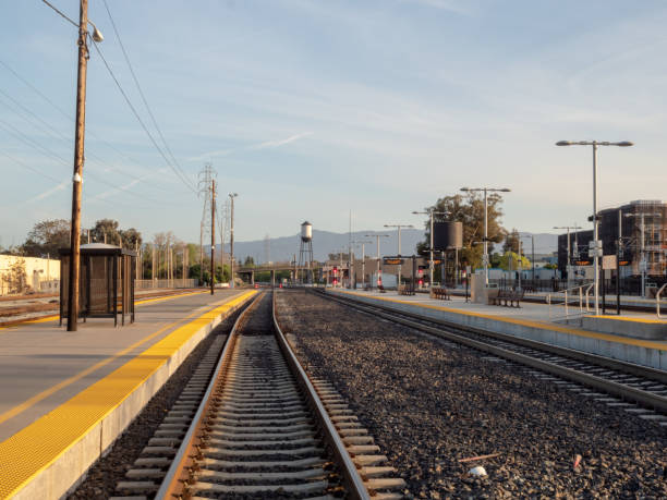 istock A railroad stretches into the horizon going from a train station 948095554