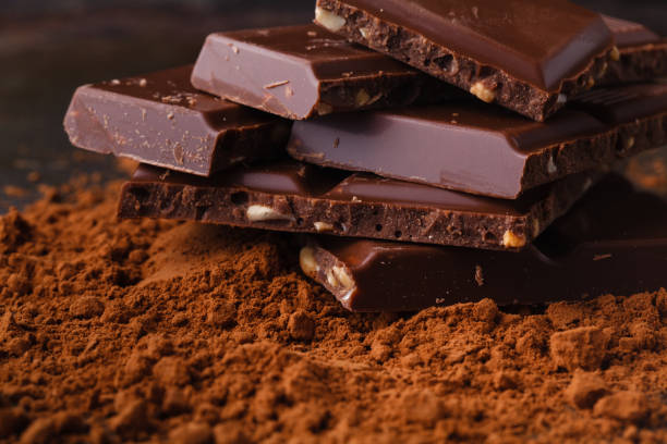 istock Pieces chocolate on a dark wooden background 948096446