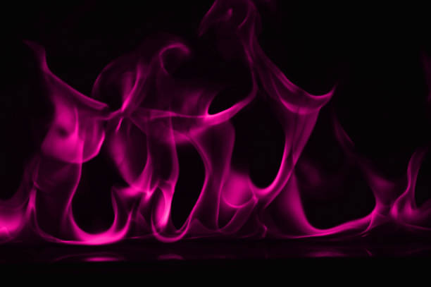 istock Beautiful fire pink flames on a black background. 948100596