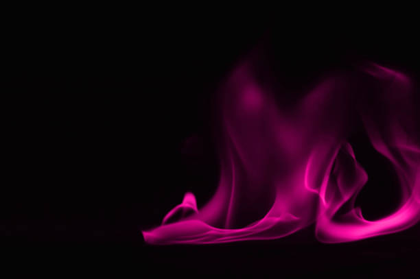 istock Beautiful fire pink flames on a black background. 948101196