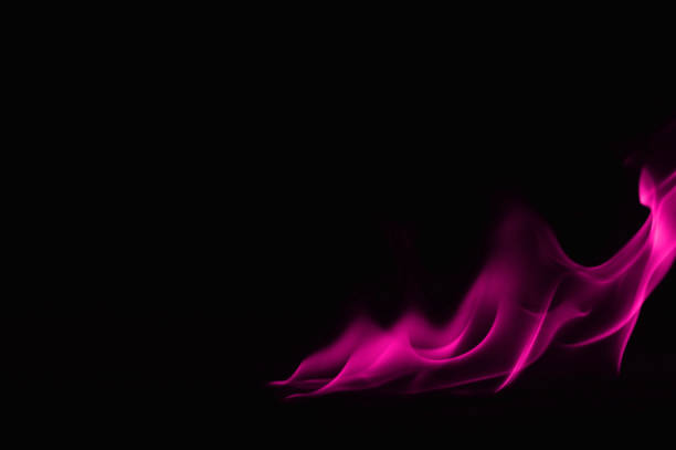 istock Beautiful fire pink flames on a black background. 948101450