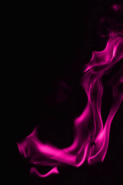 istock Beautiful fire pink flames on a black background. 948101510