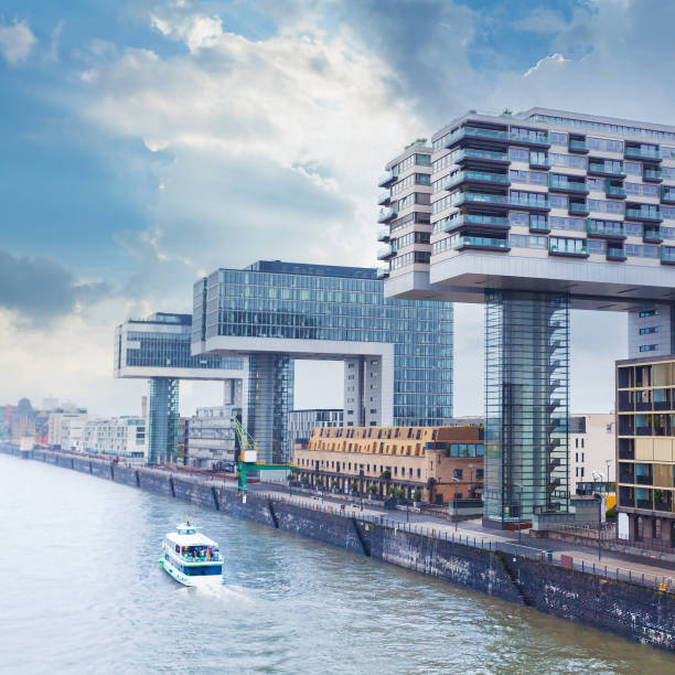 istock Modern business center on blue sky background in Cologne, Germany 948101570