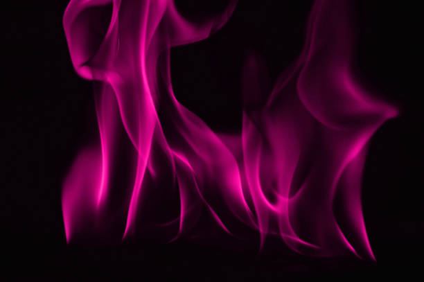 istock Beautiful fire pink flames on a black background. 948101588