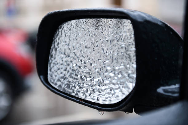 istock Car covered in ice during freezing rain phenomenon 948105170