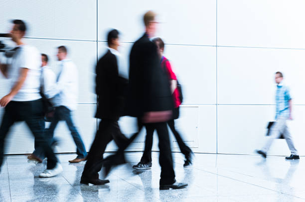 istock blurred people at a trade fair hall 948116800