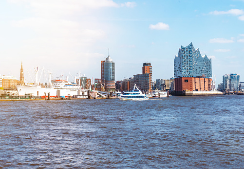 Elbe river and waterfront skyline in Hamburg, Germany on sunny day