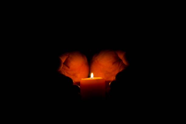 istock the candle burns in the dark 948137268