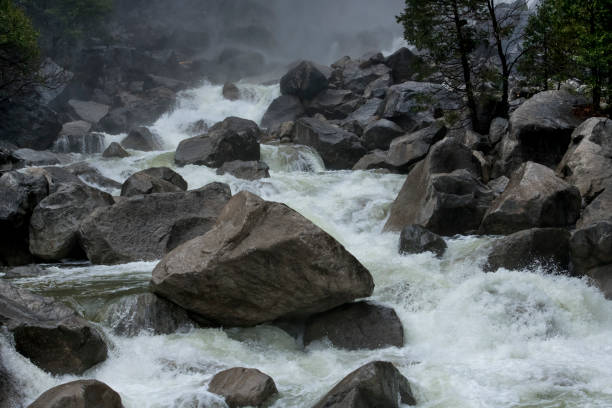 Yosemite Falls gushing over granite boulders