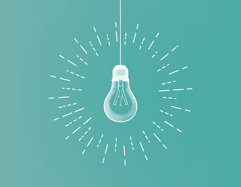 White line art light bulb illustration on green background with glowing starburst