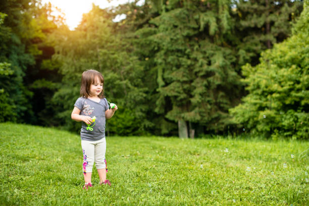 istock Cute little girl in nature 948182434