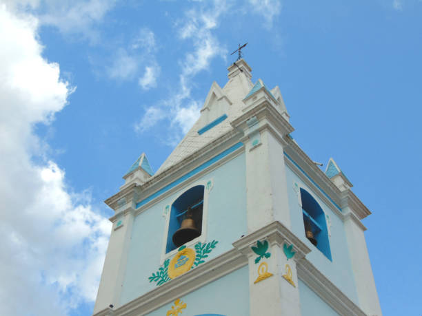 istock Catholic church tower with bell and cross 948198366