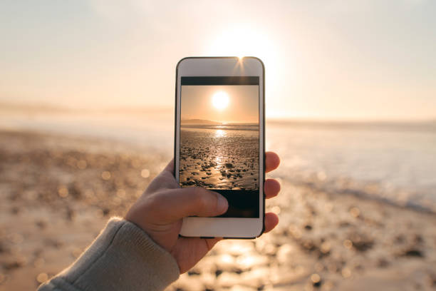 istock Taking a photo of the sunset 948205328