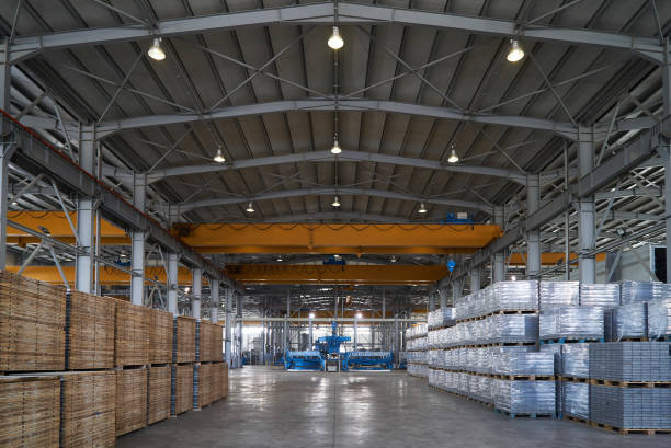 istock Large warehouse hangar of factory interior 948208570