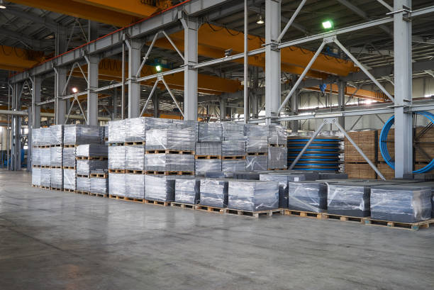 istock Large warehouse hangar of factory interior 948208720