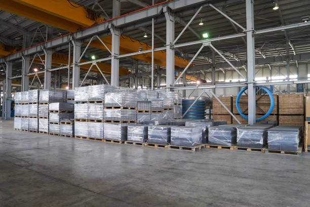 istock Large warehouse hangar of factory interior 948208956