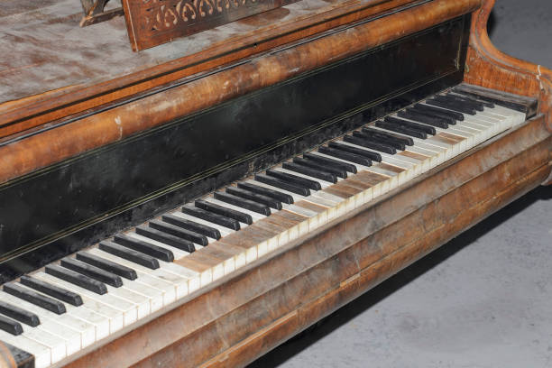istock Classic old grand piano, with shabby keys 948215952