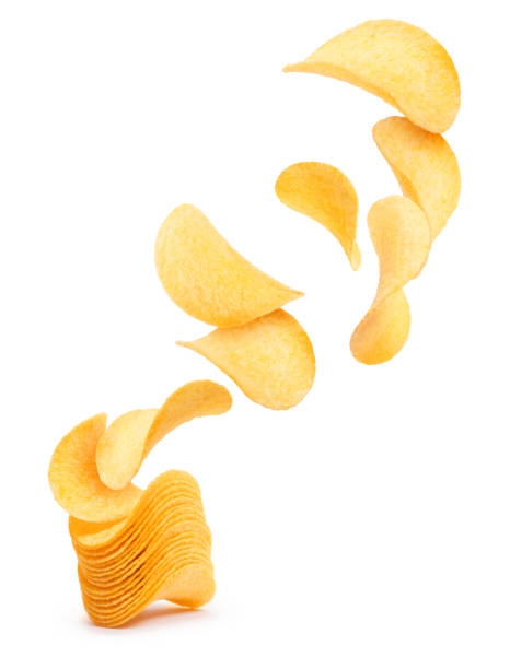 istock Potato chips fly out of the pile with chips on white background 948222978