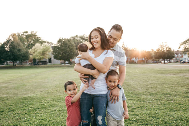 Family with three kids having fun Family having fun filipino family stock pictures, royalty-free photos & images