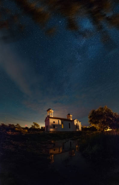 istock Nightscapes with starry sky over a chapel 948240226