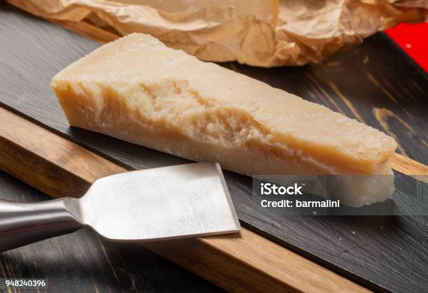 Man Cooking With Hard Italian Cheese Grated Parmesan Or Grana Padano Cheese  Hand With Grater Stock Photo - Download Image Now - iStock