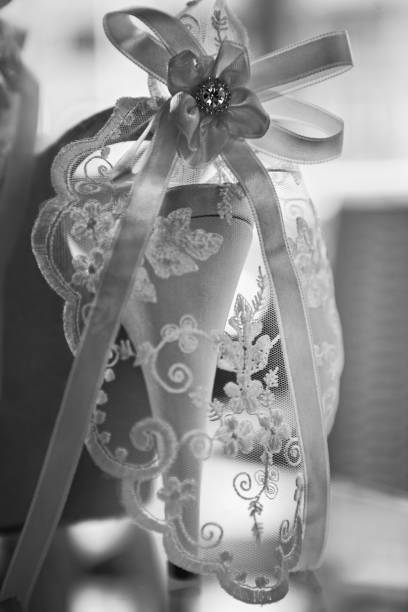 A close-up of the wedding dress showing the texture and decorative parts
