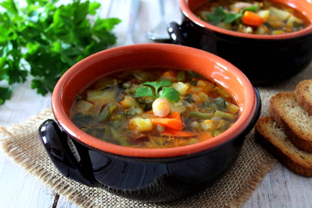 istock Vegetables soup on the wooden table. 948250206