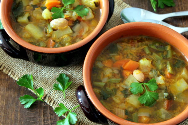 istock Vegetables soup on the wooden table. 948250324