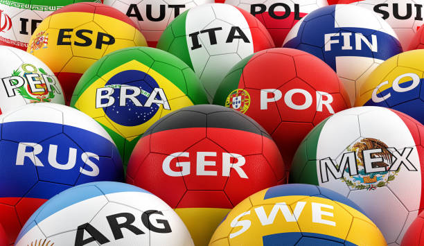 istock soccer balls colored in different national flag colors - 3D rendering 948256398